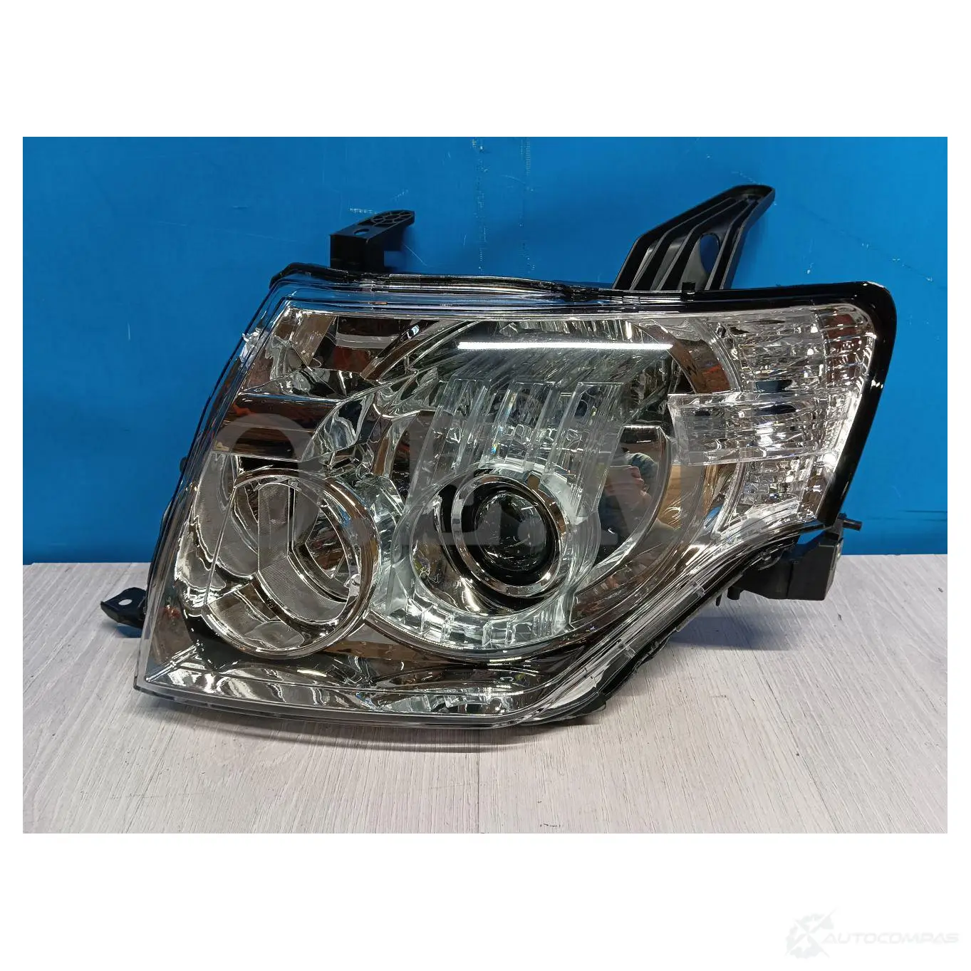 Фара левая Mitsubishi Pajero 4 (2006-нв) галоген, под габарит O.E.M. 1440008491 OEM0092FL 6S25E TK
